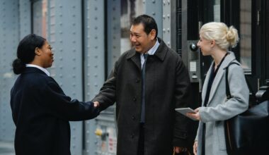 three business people shaking hands
